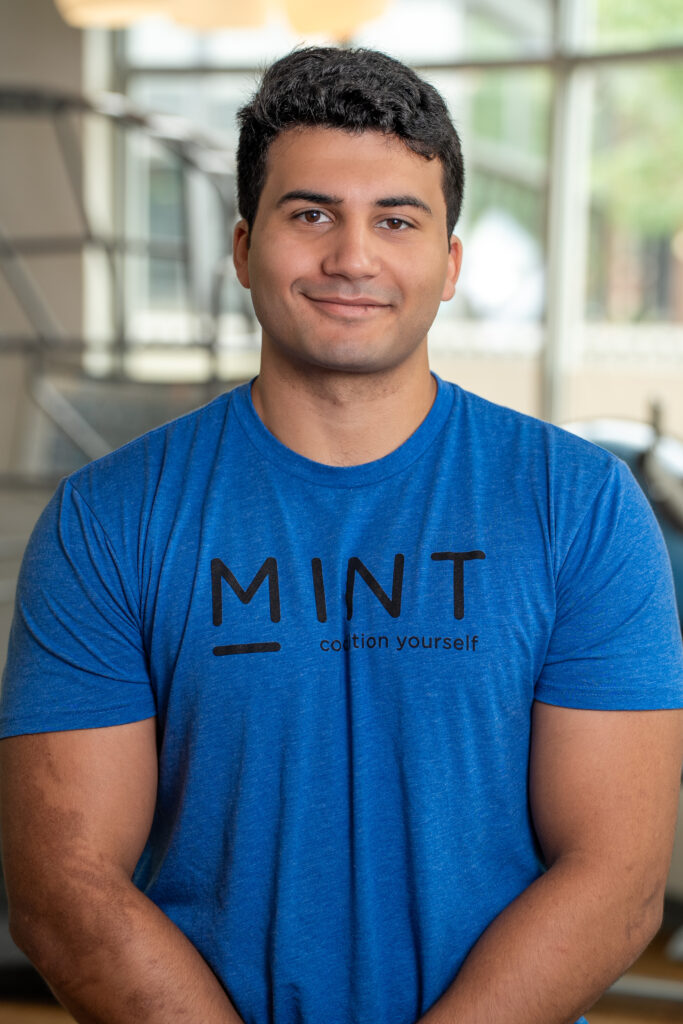 Charlie Martel, new personal trainer at MINT DC, specializing in empowering strength training for building muscle and confidence